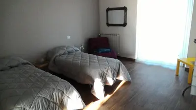 Letto o letti in una camera di TalialETNA Apartments