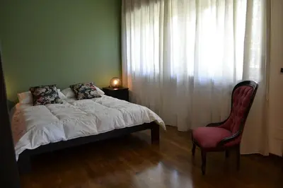 Letto o letti in una camera di La Casetta