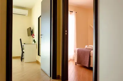 Letto o letti in una camera di B&B Prima Classe