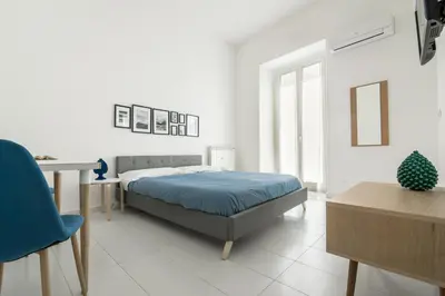 Letto o letti in una camera di TERRAZZO SICILIANO