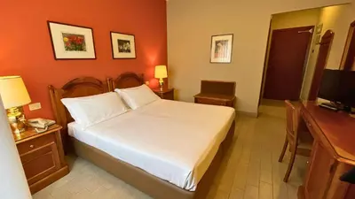 Letto o letti in una camera di Garden Hotel Catania