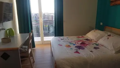 Letto o letti in una camera di La Casa del Viaggiatore