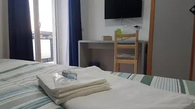 Letto o letti in una camera di La Casa del Viaggiatore