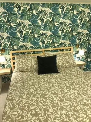 Letto o letti in una camera di Villa Lattea
