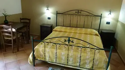 Letto o letti in una camera di Agriturismo Il Pozzo Antico