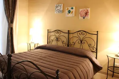 Letto o letti in una camera di B&B Residenza Umberto