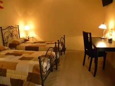 Letto o letti in una camera di B&B Residenza Umberto