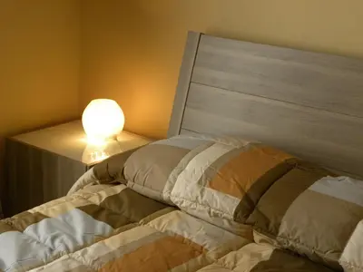 Letto o letti in una camera di B&B Residenza Umberto