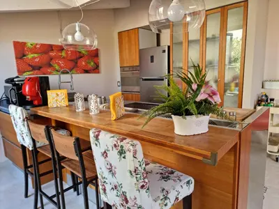 Cucina o angolo cottura di Luxury Panoramic Loft with heated pool near Catania, Taormina, the Sea and Mount Etna by SicilianRelaxingHomes