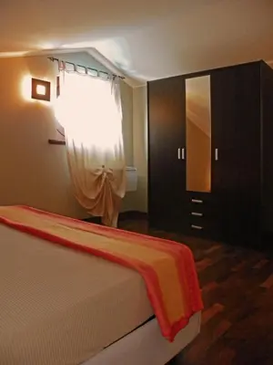 Letto o letti in una camera di VILLA VITTORIA