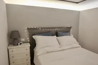 Letto o letti in una camera di Acquabianca