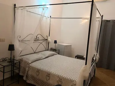 Letto o letti in una camera di FOUR SEASONS