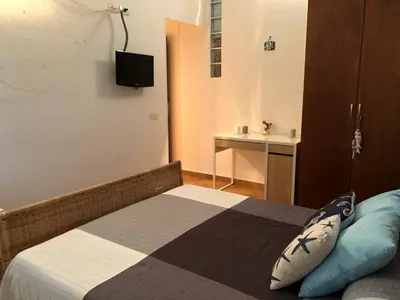 Letto o letti in una camera di FOUR SEASONS