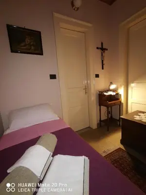 Letto o letti in una camera di La Rosa dell'Etna