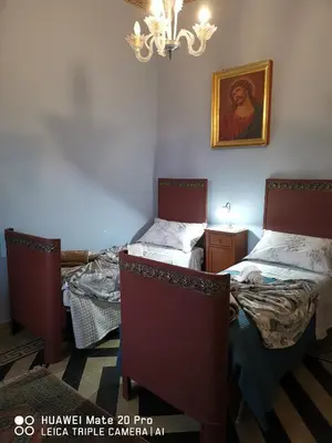 Letto o letti in una camera di La Rosa dell'Etna