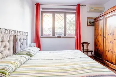 Letto o letti in una camera di Casa Paradiso sul Mare delle Aci