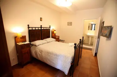 Letto o letti in una camera di Casale Poggio del Tiglio