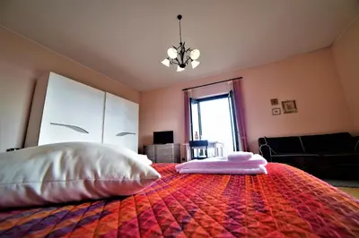 Letto o letti in una camera di B&B Dimora dell' Etna