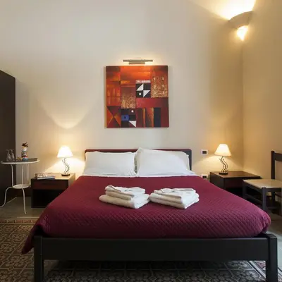 Letto o letti in una camera di Antiche Volte