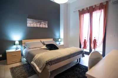 Letto o letti in una camera di B&B LAVIKA PEDARA