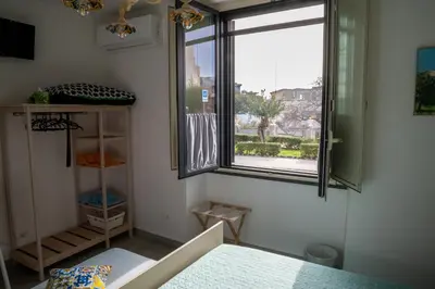 Letto o letti in una camera di La Zagara