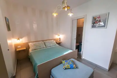 Letto o letti in una camera di La Zagara