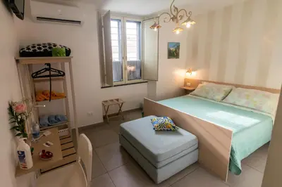 Letto o letti in una camera di La Zagara
