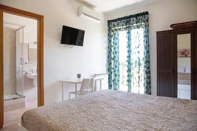 Letto o letti in una camera di B&B Etna Europa