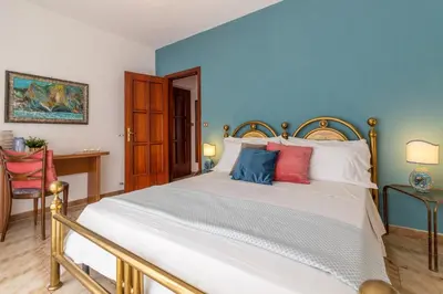 Letto o letti in una camera di Scariceddu