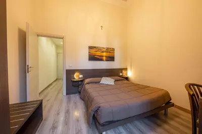 Letto o letti in una camera di B&B Ambitious