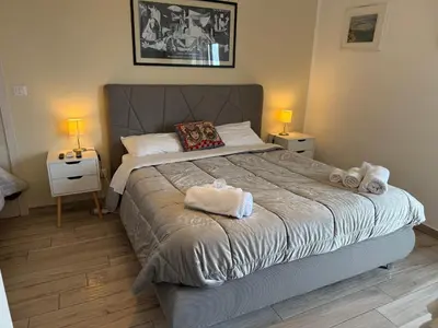 Letto o letti in una camera di CESARE Guest House