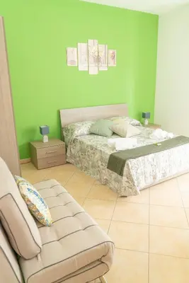 Letto o letti in una camera di B&B Alle Falde Dell'Etna