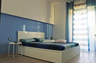 Letto o letti in una camera di b&b Appiddaveru