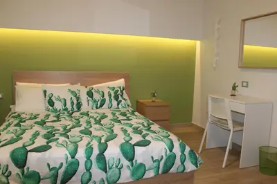 Letto o letti in una camera di b&b Appiddaveru