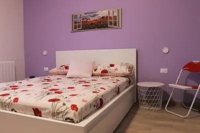 Letto o letti in una camera di b&b Appiddaveru