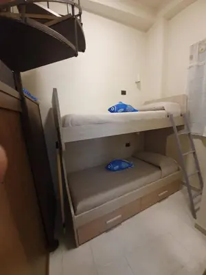 Letto o letti in una camera di Charme in Aci Castello