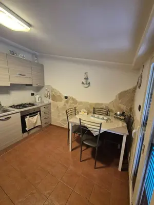 Cucina o angolo cottura di Charme in Aci Castello
