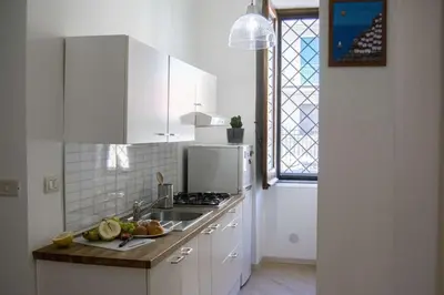 Cucina o angolo cottura di La Casa del Moro Catania Centro - Villa Bellini