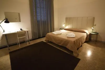 Letto o letti in una camera di TIFEO Bed & Breakfast