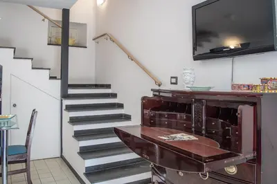 TV o dispositivi per l'intrattenimento presso Camula inn Apartament