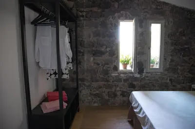 Letto o letti in una camera di Ghè House
