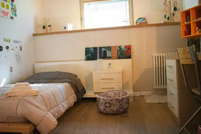 Letto o letti in una camera di Ghè House