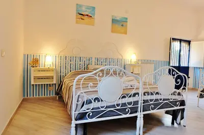 Letto o letti in una camera di B&B CasaNera