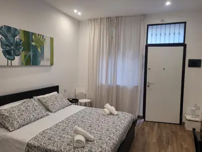 Letto o letti in una camera di Casa del Forestiero