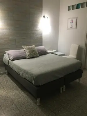 Letto o letti in una camera di Casagioieni