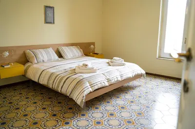 Letto o letti in una camera di Le Vigne - Villa overlooking Etna