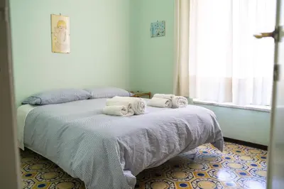 Letto o letti in una camera di Le Vigne - Villa overlooking Etna