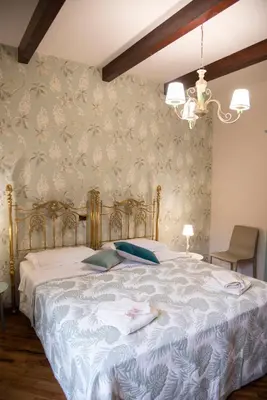 Letto o letti in una camera di Boutique Villa Etna d'A'mare