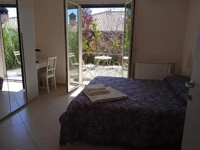 Letto o letti in una camera di L'elicriso B&B
