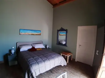 Letto o letti in una camera di L.T. METIS
